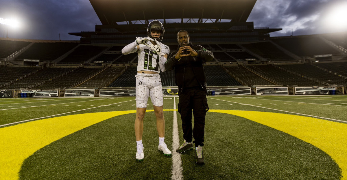 2025 wide receiver Cooper Perry with Junior Adams.